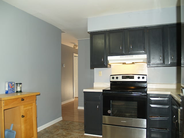 kitchen featuring stainless steel range with electric stovetop