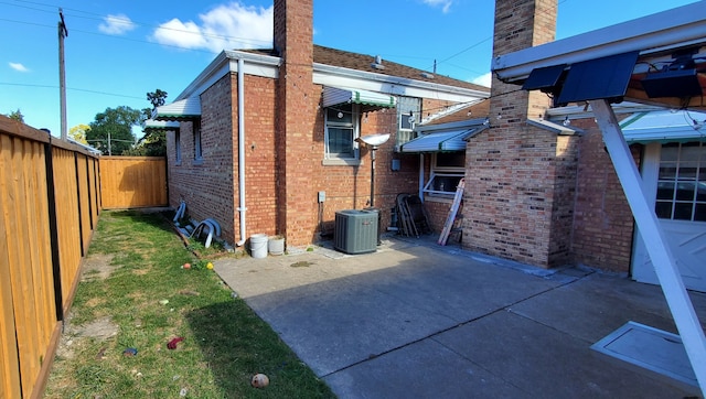 view of home's exterior featuring a patio and central AC