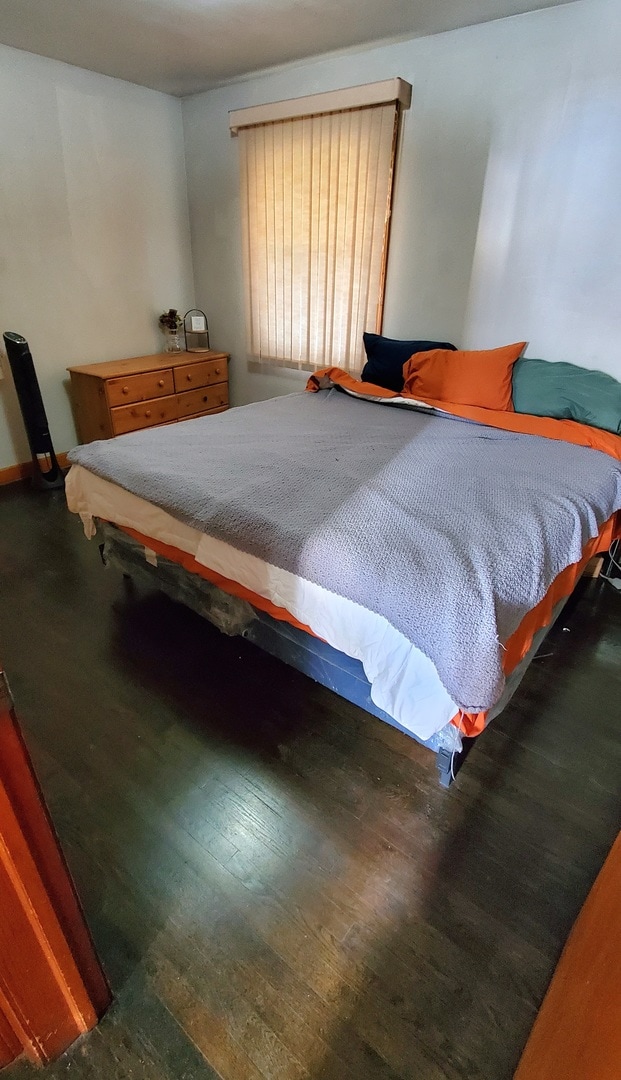 bedroom featuring hardwood / wood-style floors