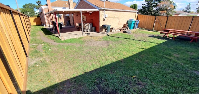 view of yard featuring a patio area