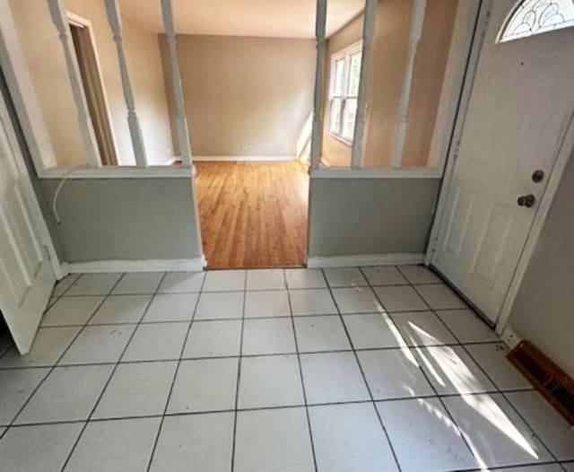 view of tiled foyer entrance