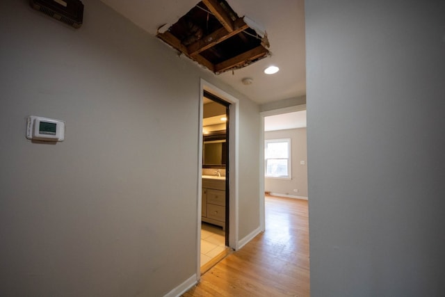 hallway featuring light hardwood / wood-style floors