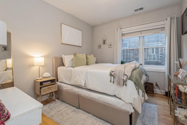 bedroom featuring light hardwood / wood-style flooring