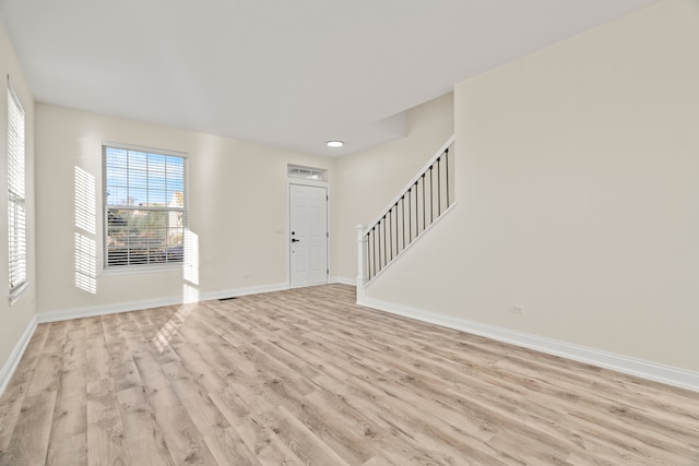 entryway with light wood-type flooring