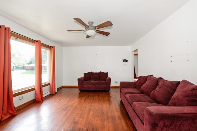 living room with hardwood / wood-style flooring and ceiling fan