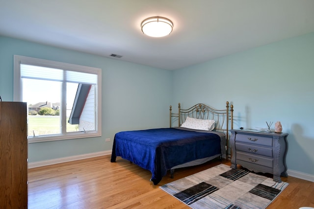 bedroom featuring light hardwood / wood-style floors