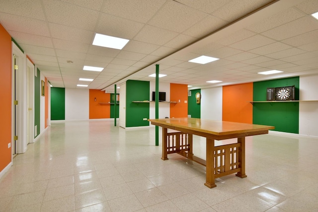 interior space featuring a drop ceiling