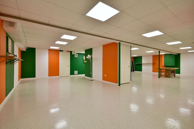 interior space featuring a paneled ceiling