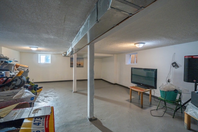 basement with a textured ceiling