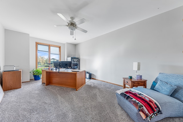 carpeted home office with ceiling fan