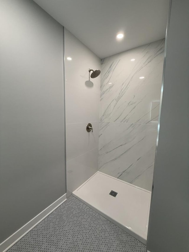 bathroom featuring tile patterned flooring and walk in shower