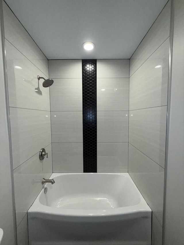 bathroom featuring bathing tub / shower combination