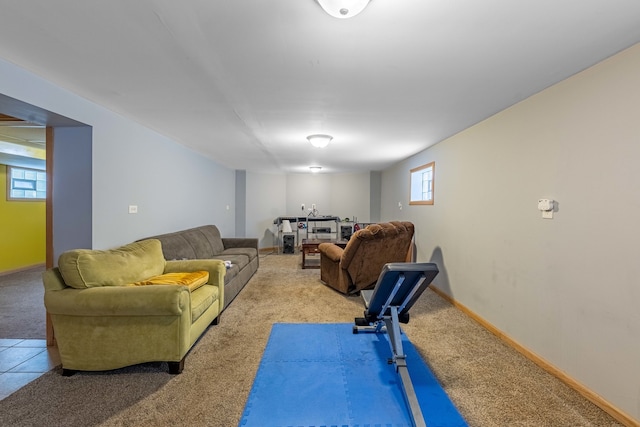 workout area featuring light colored carpet