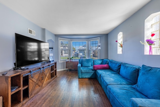 living room featuring dark hardwood / wood-style flooring