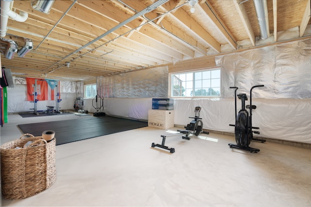 exercise area featuring concrete floors