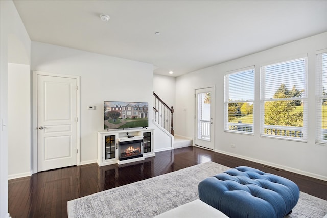 living room with dark wood-type flooring