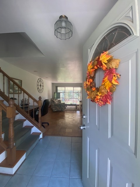 entrance foyer with tile patterned flooring