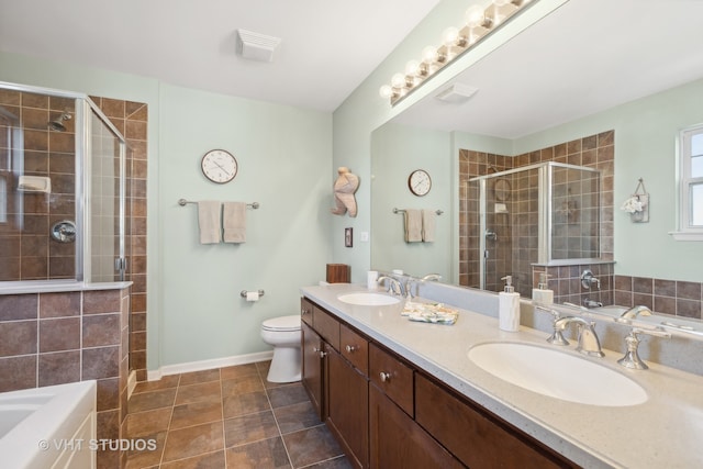 full bathroom with vanity, plus walk in shower, toilet, and tile patterned floors