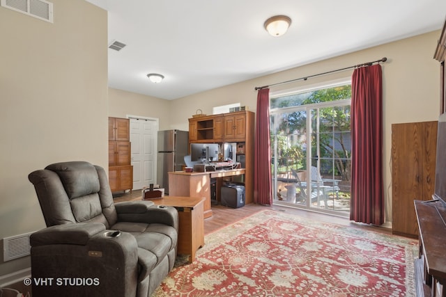 living room featuring light hardwood / wood-style flooring