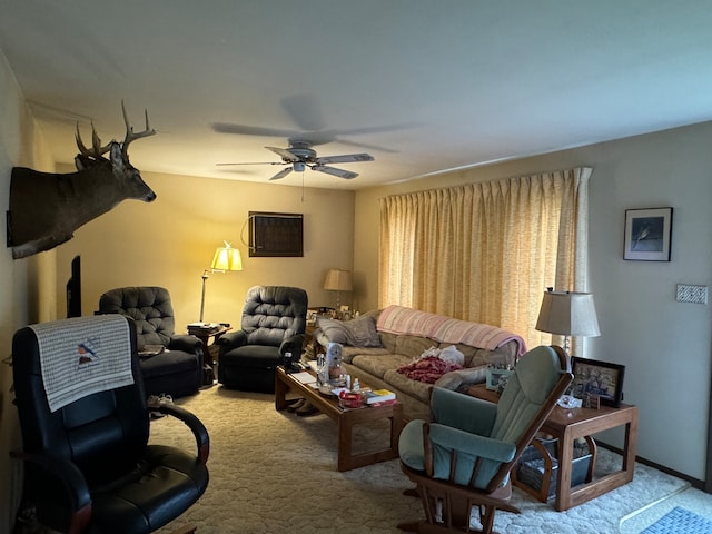 carpeted living room featuring ceiling fan