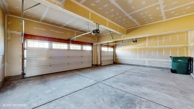 garage featuring a garage door opener