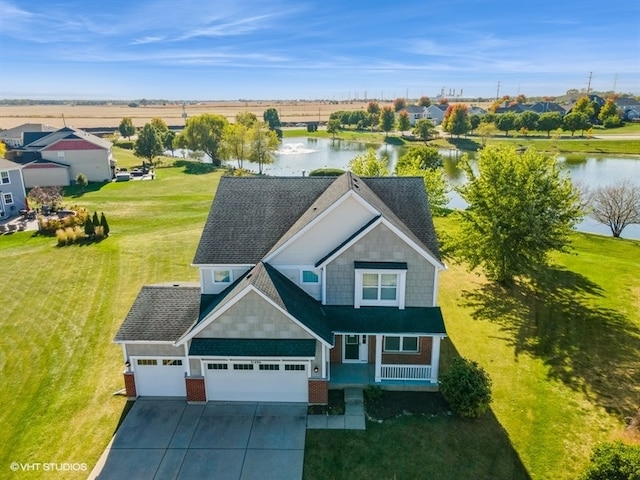 aerial view featuring a water view