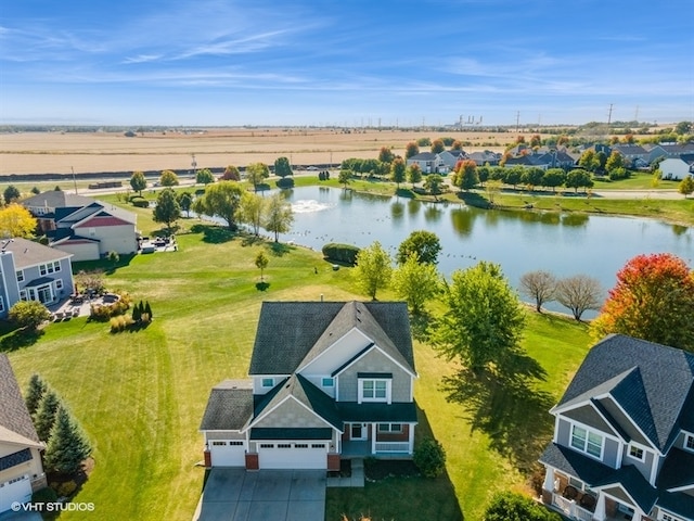 drone / aerial view with a water view