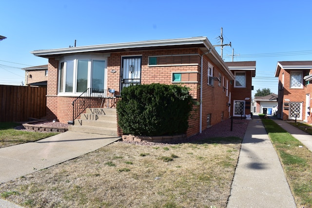 view of front of house with a front lawn