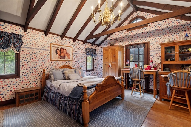 bedroom featuring beam ceiling, hardwood / wood-style floors, high vaulted ceiling, and a chandelier