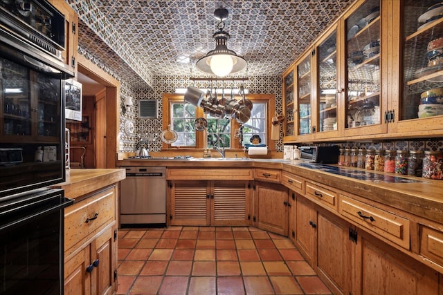 bar with dishwasher, sink, and black double oven