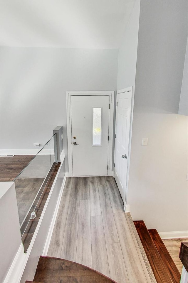 foyer entrance featuring light hardwood / wood-style flooring