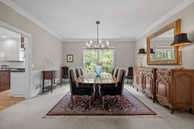 dining area featuring light carpet, crown molding, and a wealth of natural light