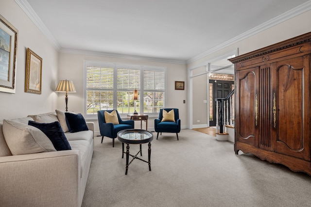 carpeted living room featuring ornamental molding