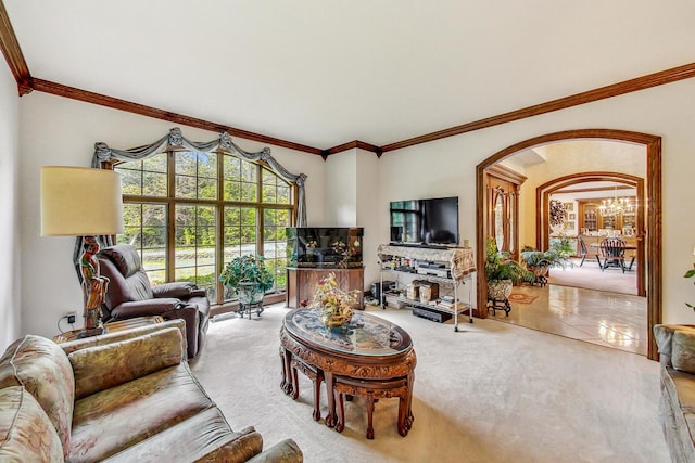 living room with crown molding, tile patterned floors, and a notable chandelier