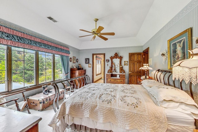 bedroom featuring light carpet and ceiling fan