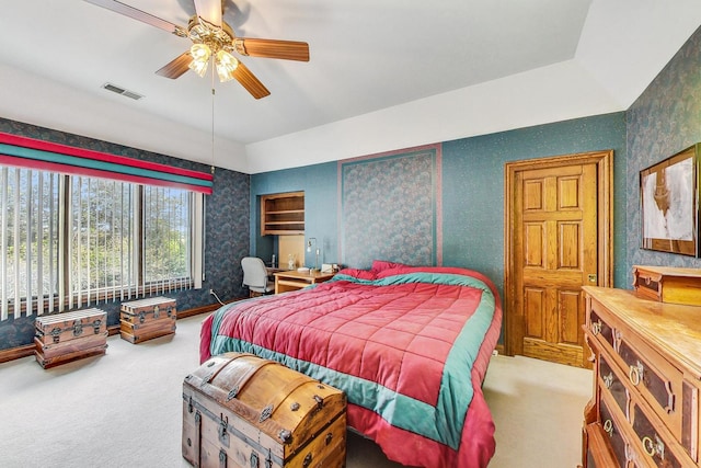 bedroom featuring ceiling fan and carpet flooring