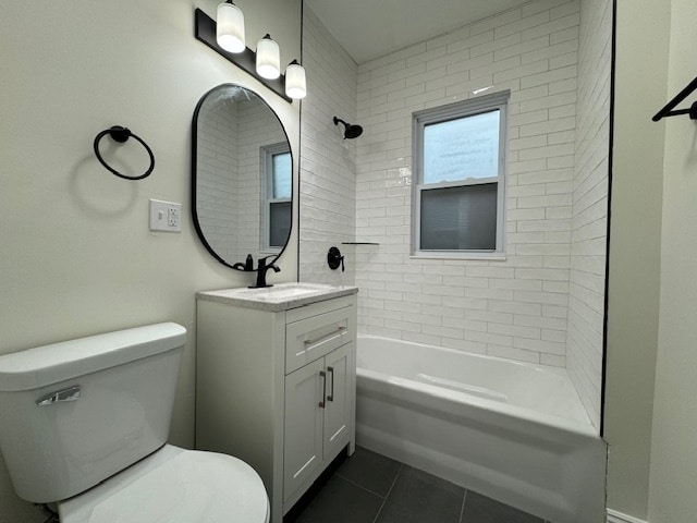 full bathroom with tile patterned floors, vanity, toilet, and tiled shower / bath