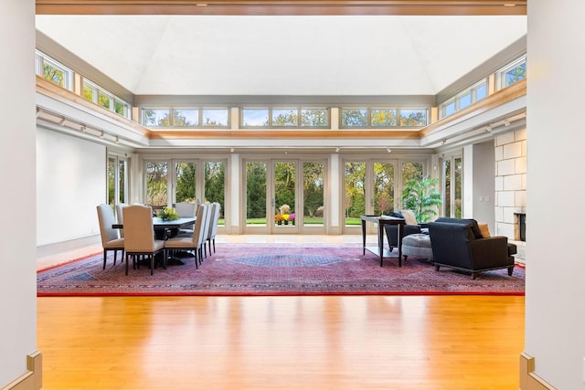 interior space with french doors and vaulted ceiling