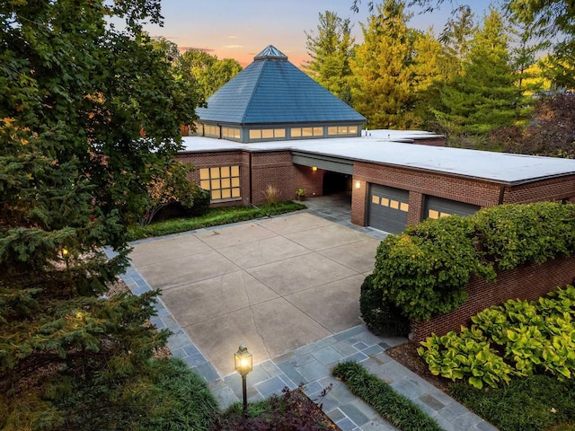 view of front of home featuring a garage