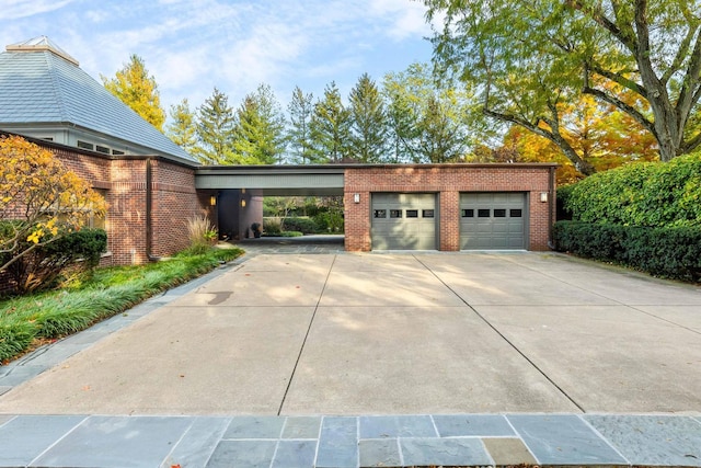 garage featuring a carport