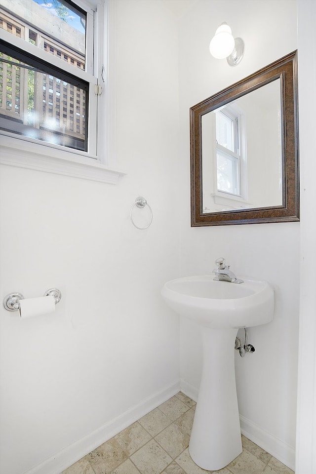 bathroom with tile patterned flooring