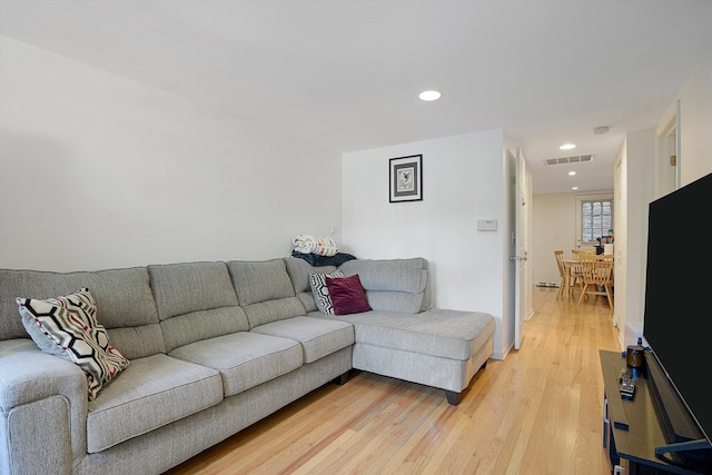 living room with hardwood / wood-style floors