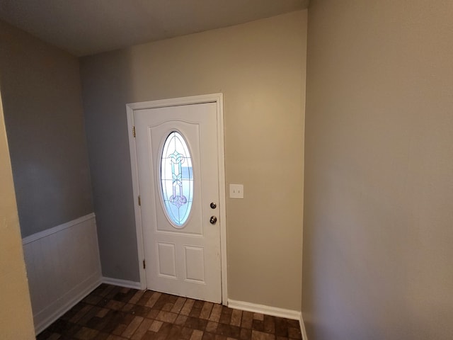 foyer entrance featuring dark hardwood / wood-style flooring