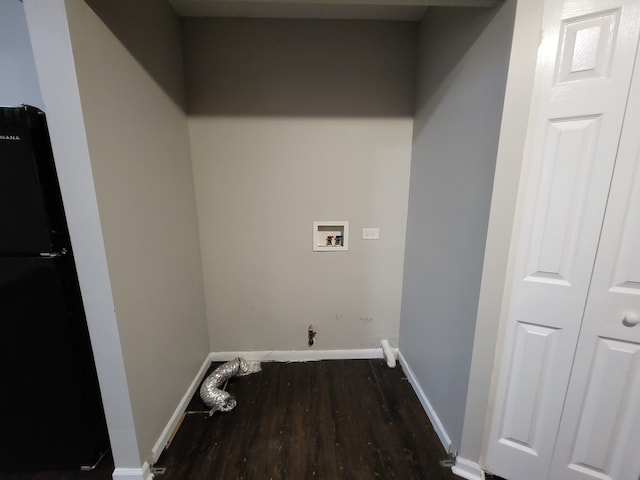 laundry room featuring washer hookup, gas dryer hookup, and dark hardwood / wood-style floors