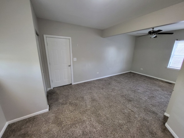 carpeted empty room with ceiling fan