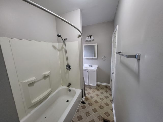 bathroom featuring tub / shower combination and vanity