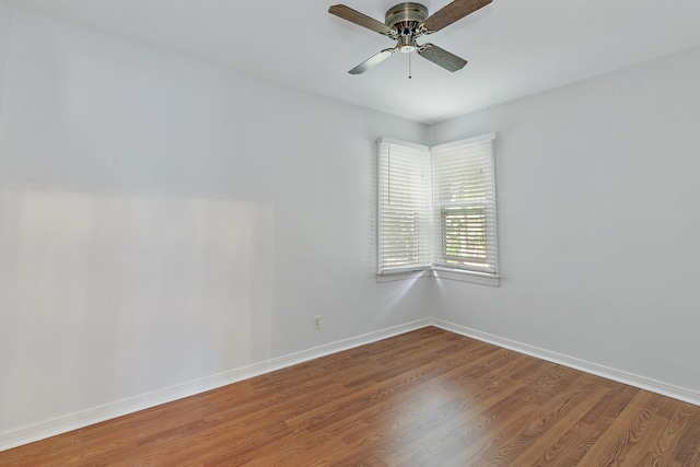 unfurnished room featuring ceiling fan and hardwood / wood-style floors