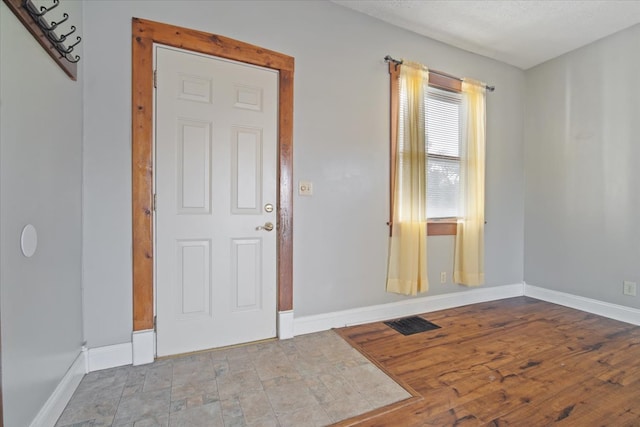 foyer featuring light hardwood / wood-style flooring