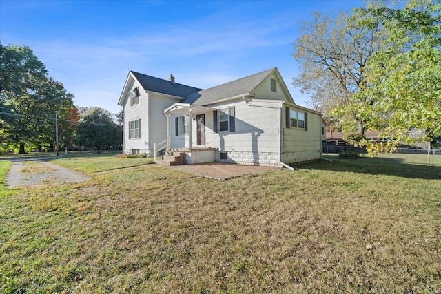 view of property exterior with a yard