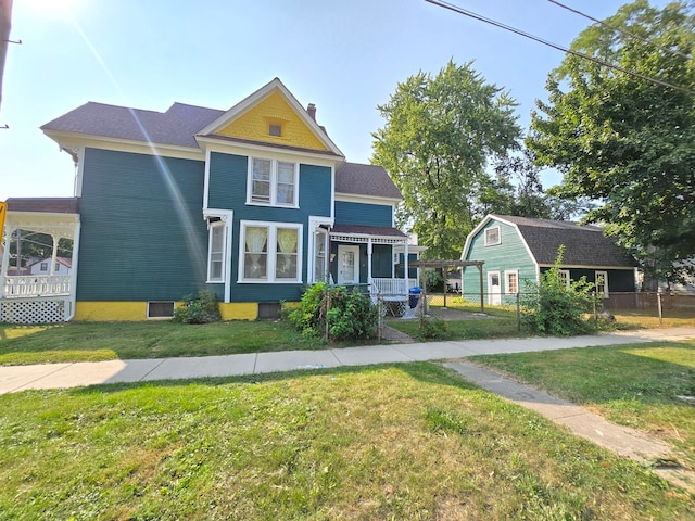 view of front of property with a front lawn